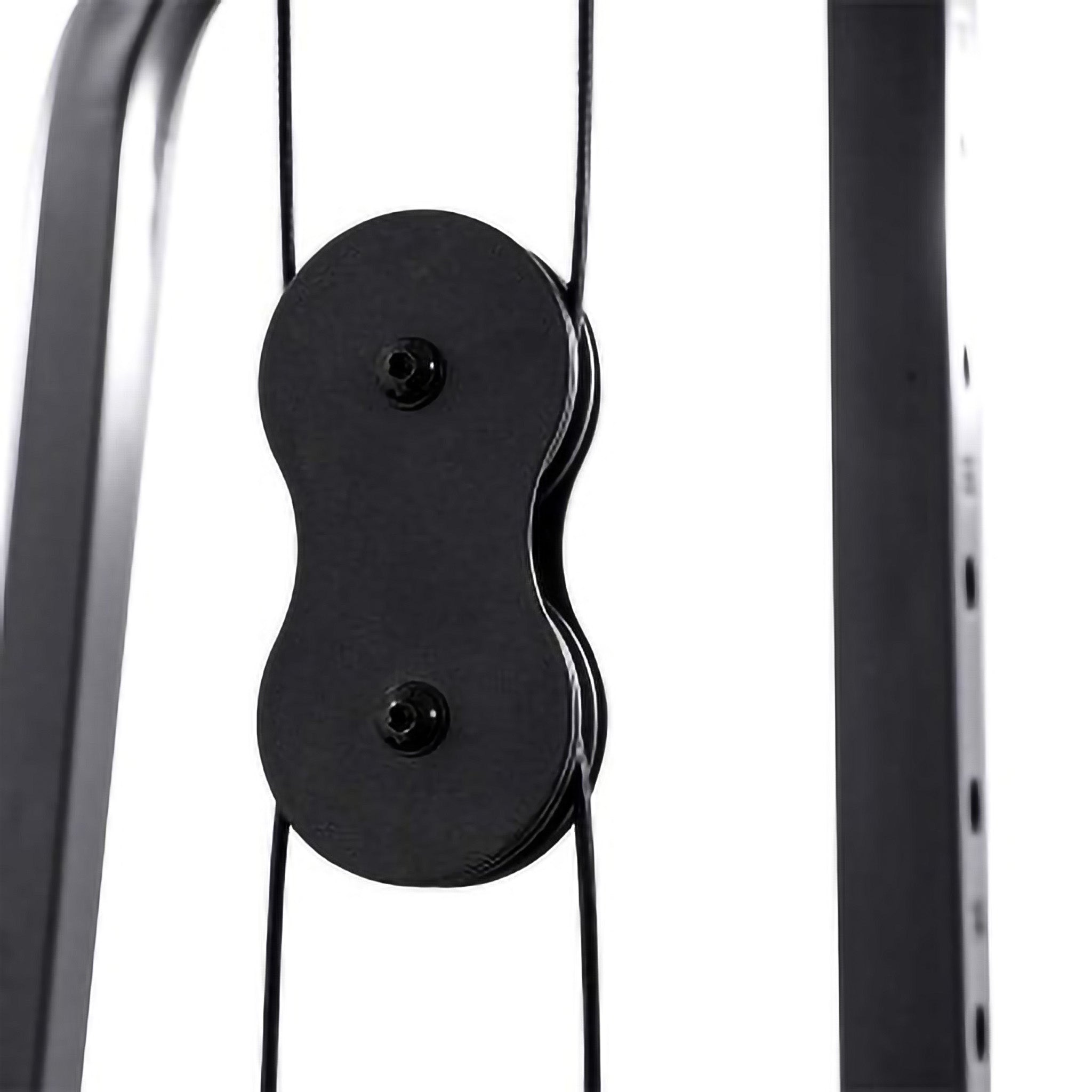 Close-up of a gym machine's weight stack with selector pin, guide rods, pulley system, and handlebar, showing detailed construction and weight increments in kilograms.