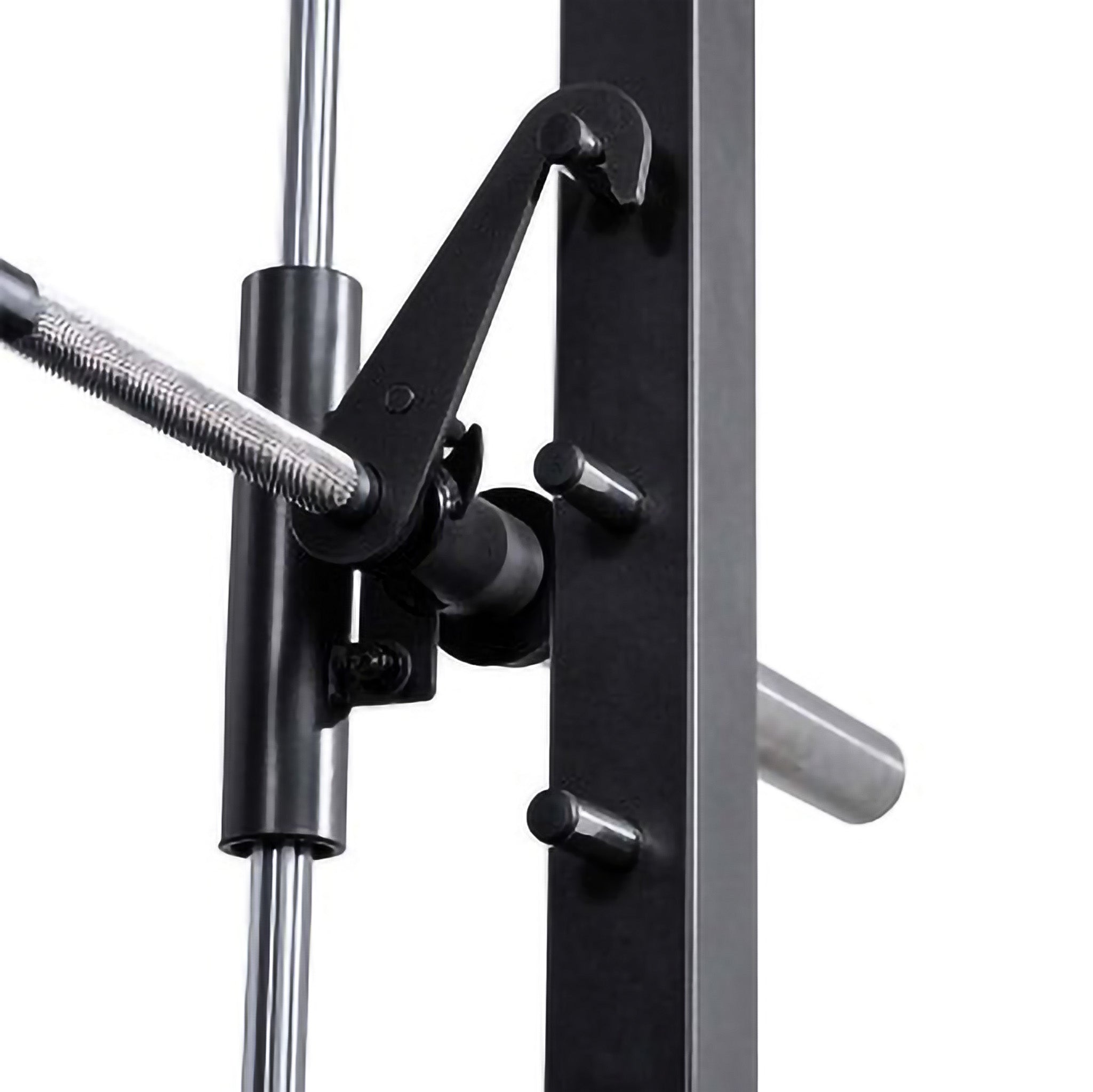 Close-up of the rotating hook and safety lock mechanism on a Smith machine barbell for secure lifting and racking